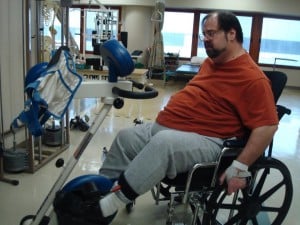 Scott pedaling the leg-bike